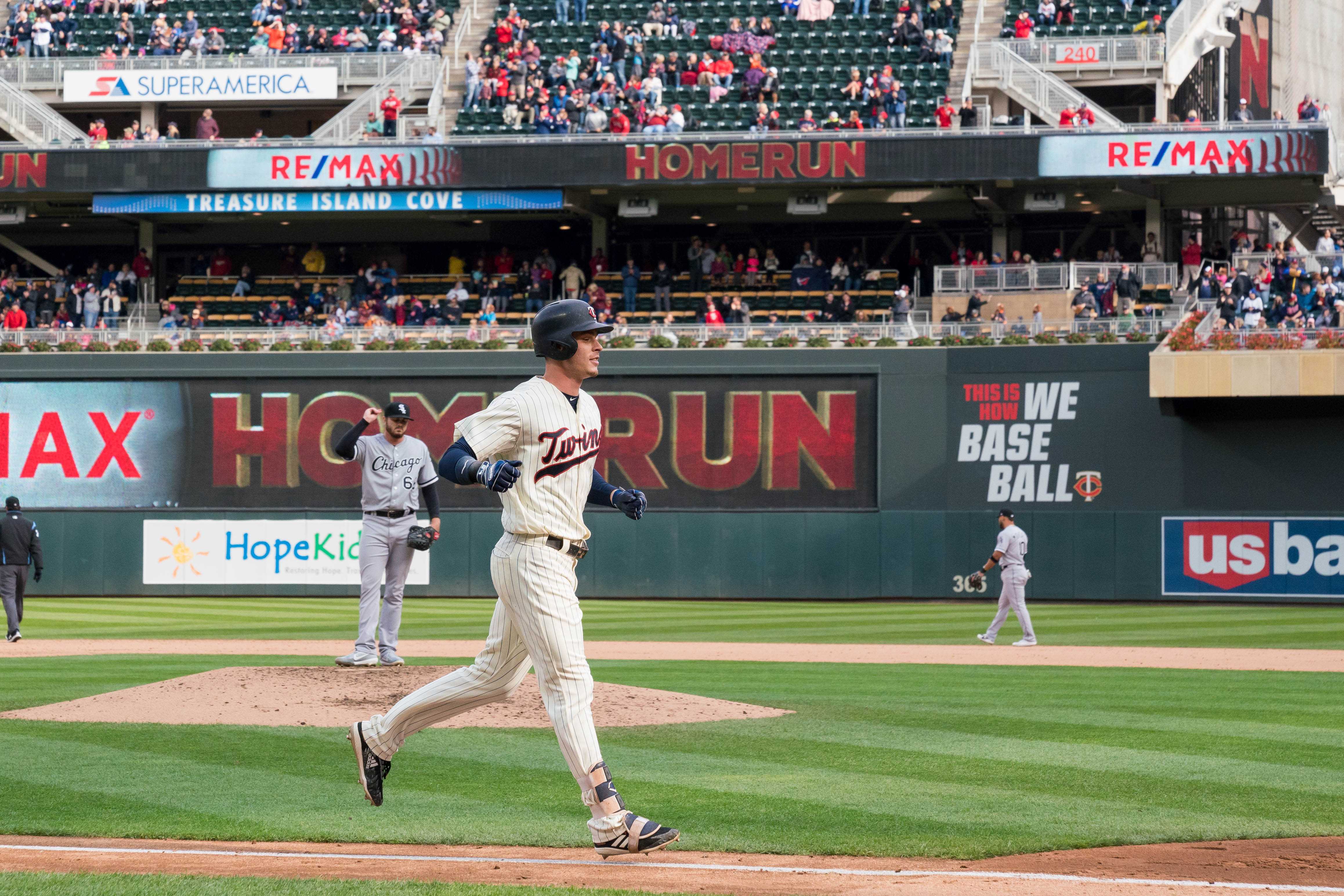 Max Kepler Minnesota Twins Unsigned Hitting in White Jersey Photograph